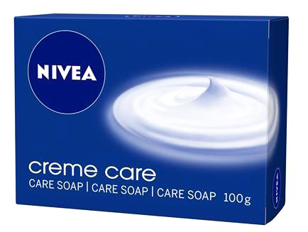 Mydło w kostce NIVEA Creme Care 100g z kremową pianą na niebieskim opakowaniu